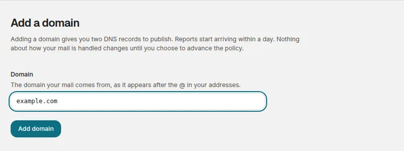 The Add domain form with example.com entered